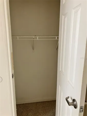 a view of a room with racks on the wall