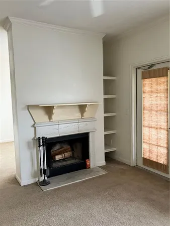 a living room with a fireplace