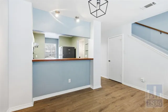 a view interior of a room and kitchen view