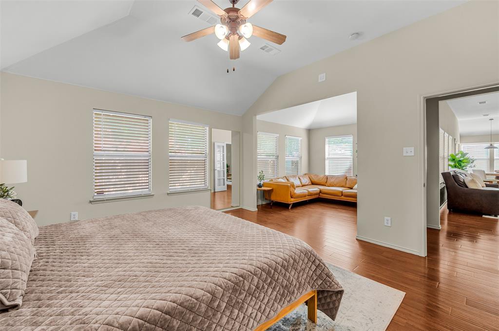 12109 Ridge Tree Road Fort Worth, TX 76036 - Photo 5 of 29 Bedroom with wood finished floors, vaulted ceiling, and ceiling fan