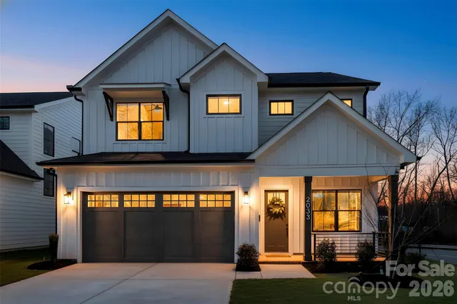 a front view of a house with yard
