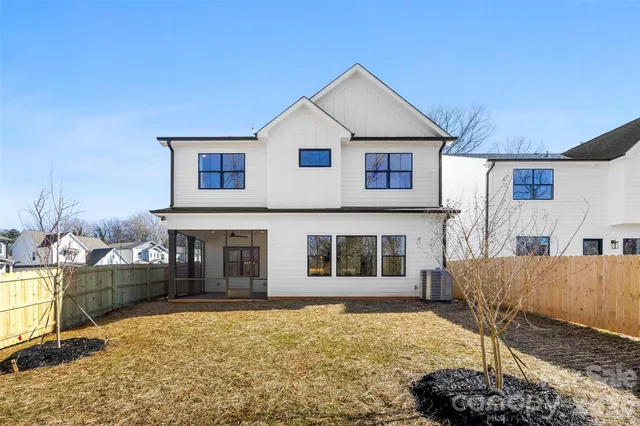 an aerial view of multiple house with yard