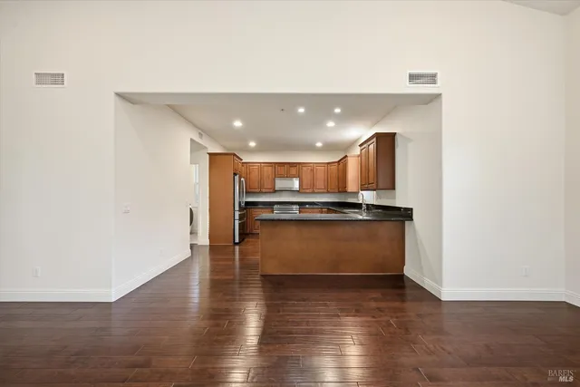 a view of kitchen with wooden floor