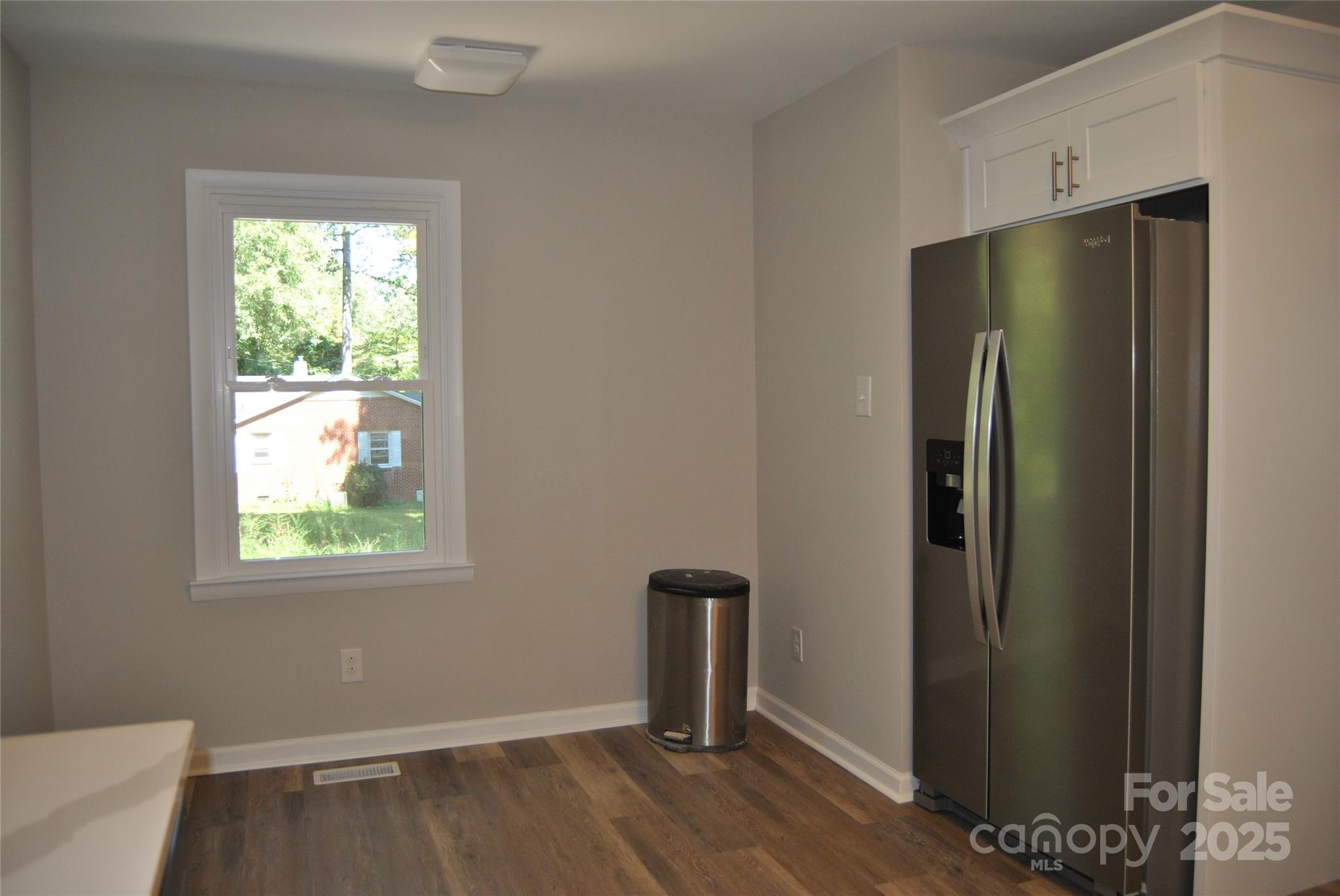 1737 Findlay Street Gastonia, NC 28052 - Photo 15 of 35 a view of empty room with wooden floor closet and windows