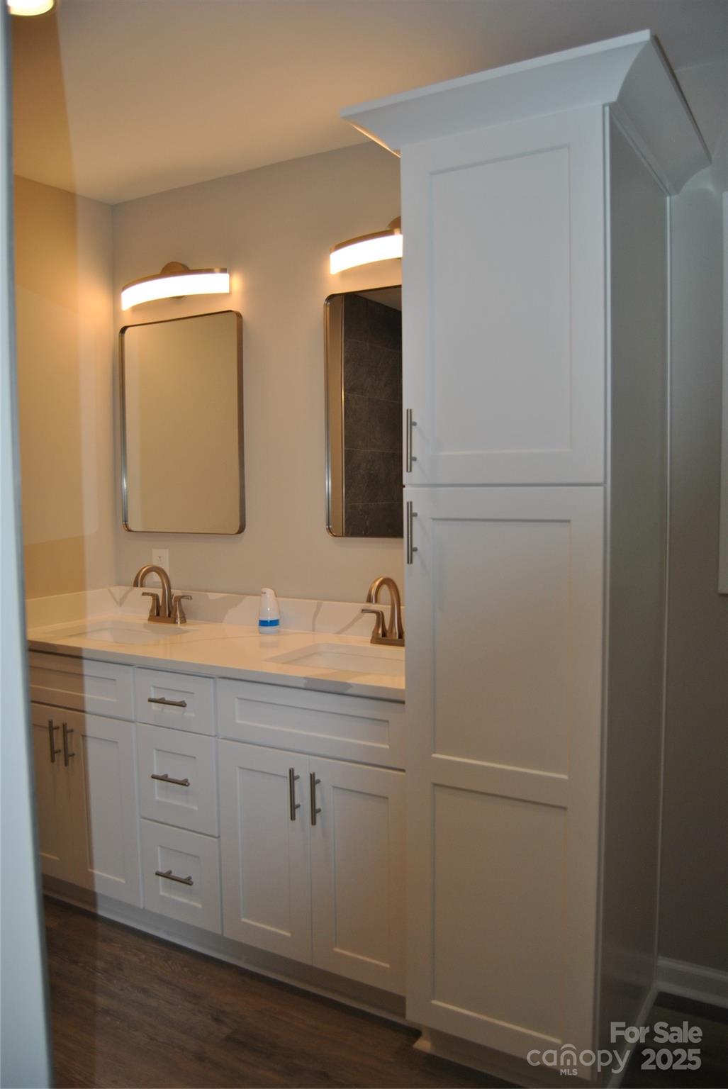1737 Findlay Street Gastonia, NC 28052 - Photo 18 of 35 a bathroom with a double vanity sink and mirror