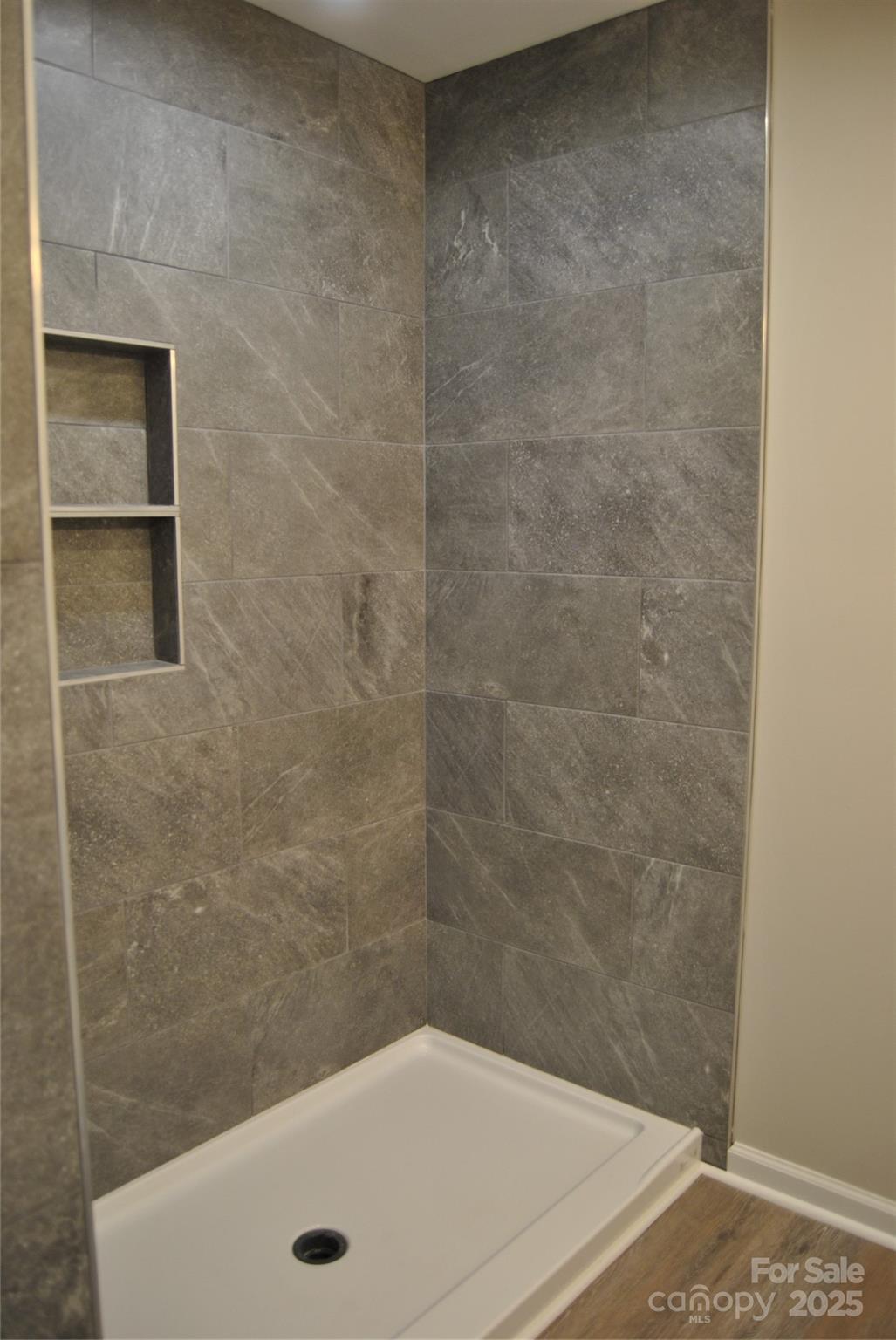 1737 Findlay Street Gastonia, NC 28052 - Photo 19 of 35 a bathroom with a white bath tub