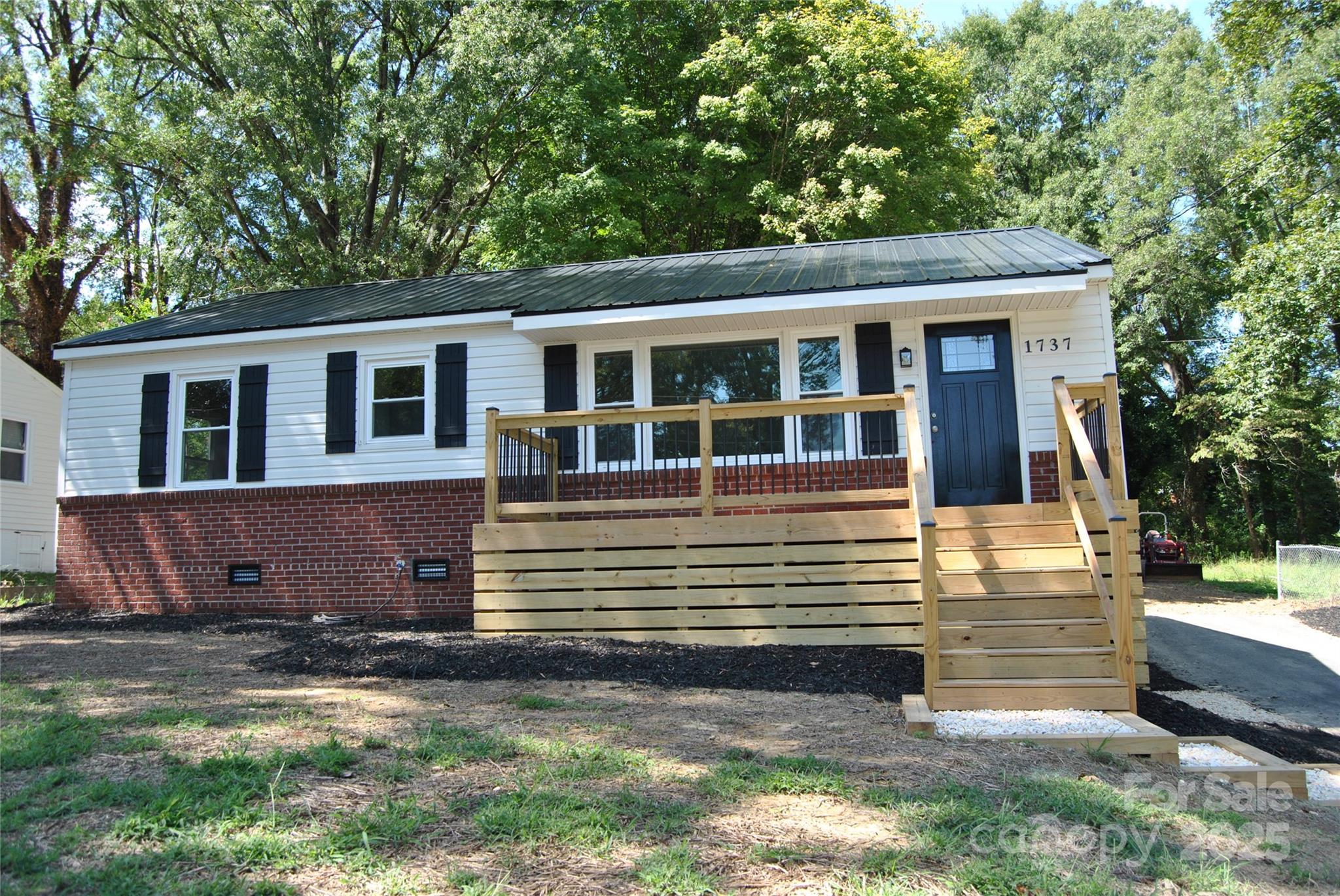 1737 Findlay Street Gastonia, NC 28052 - Photo 2 of 35 a view of a house with a yard