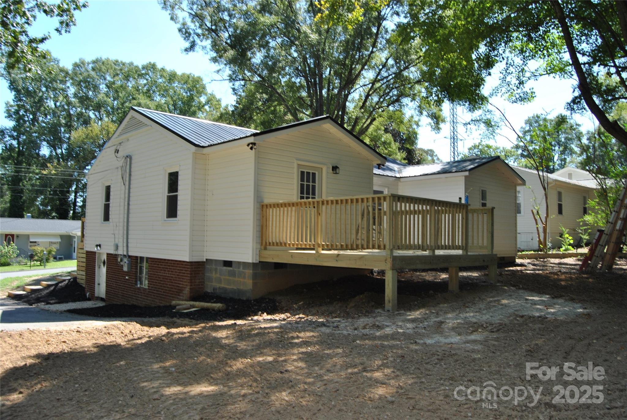 1737 Findlay Street Gastonia, NC 28052 - Photo 30 of 35 a front view of a house with a yard and garage