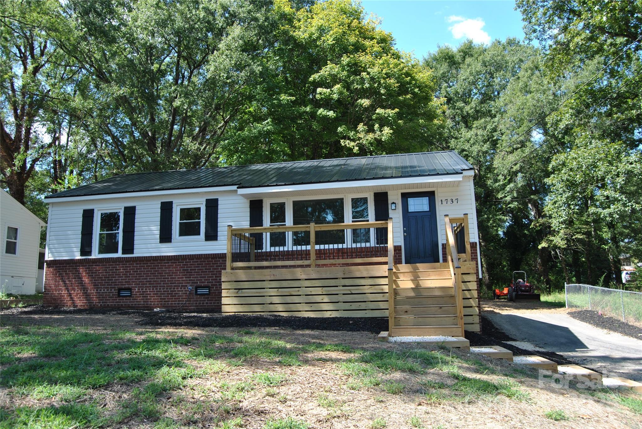 1737 Findlay Street Gastonia, NC 28052 - Photo 3 of 35 a front view of a house with a yard