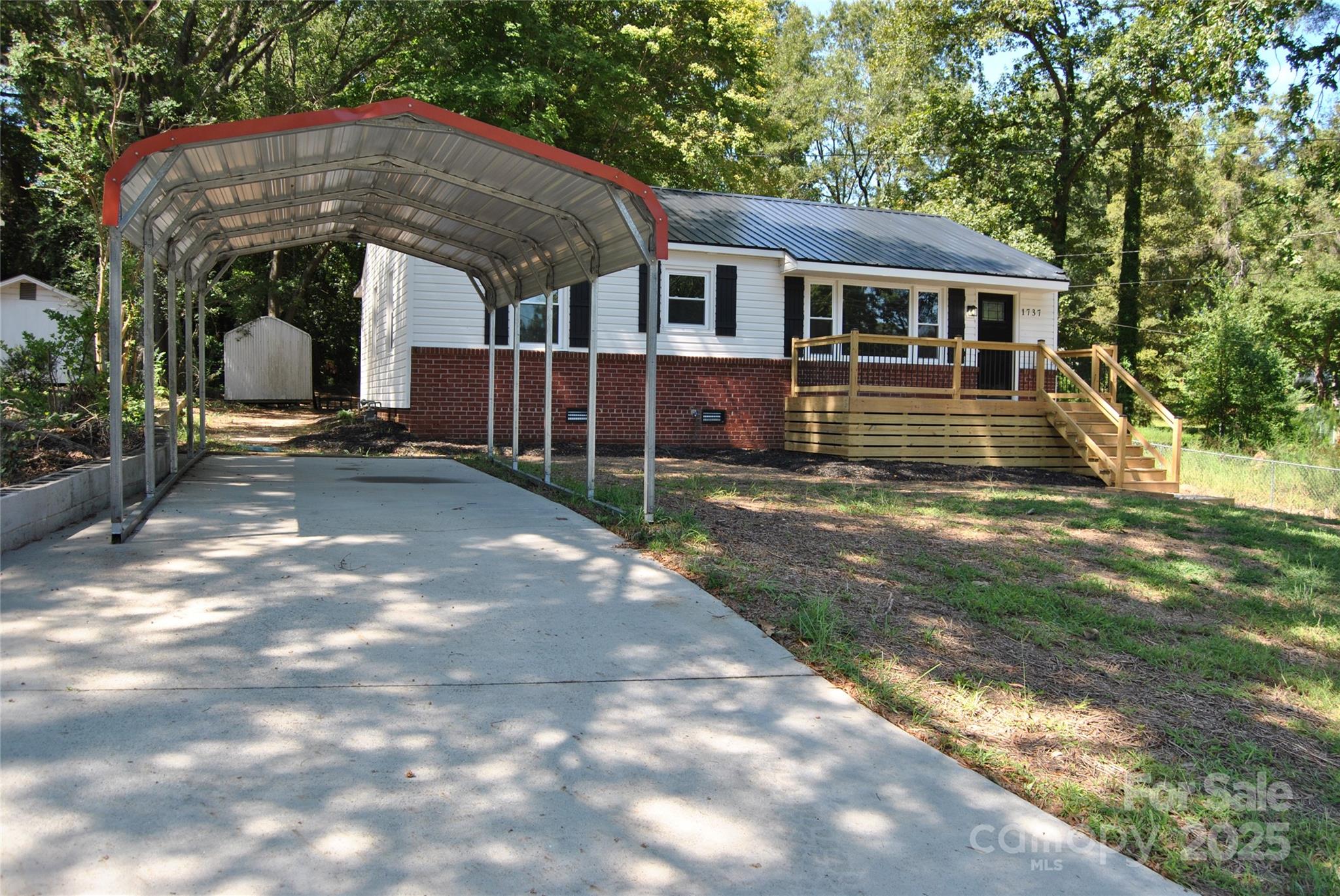 1737 Findlay Street Gastonia, NC 28052 - Photo 34 of 35 a view of a house with a yard