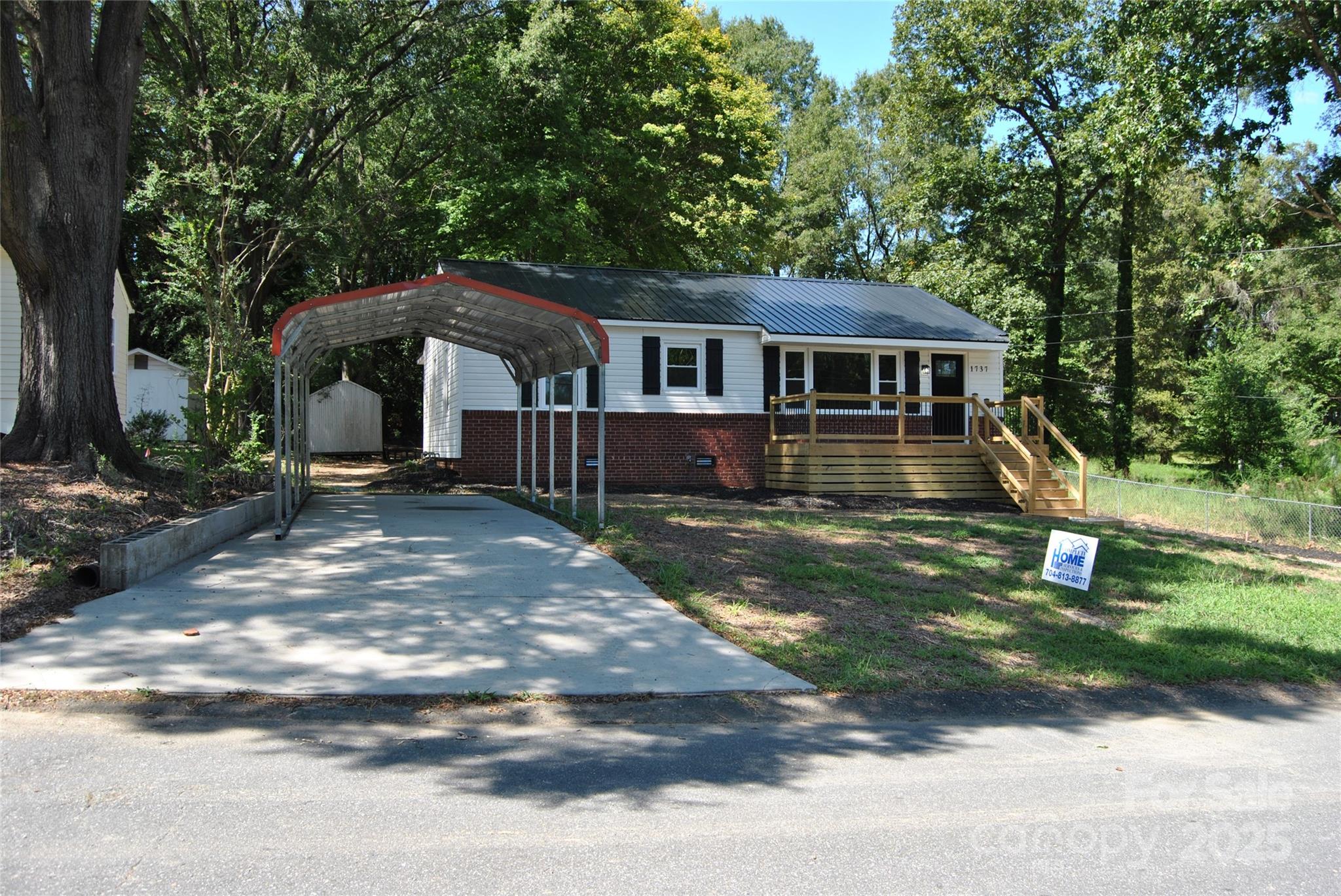 1737 Findlay Street Gastonia, NC 28052 - Photo 35 of 35 a front view of a house with a yard