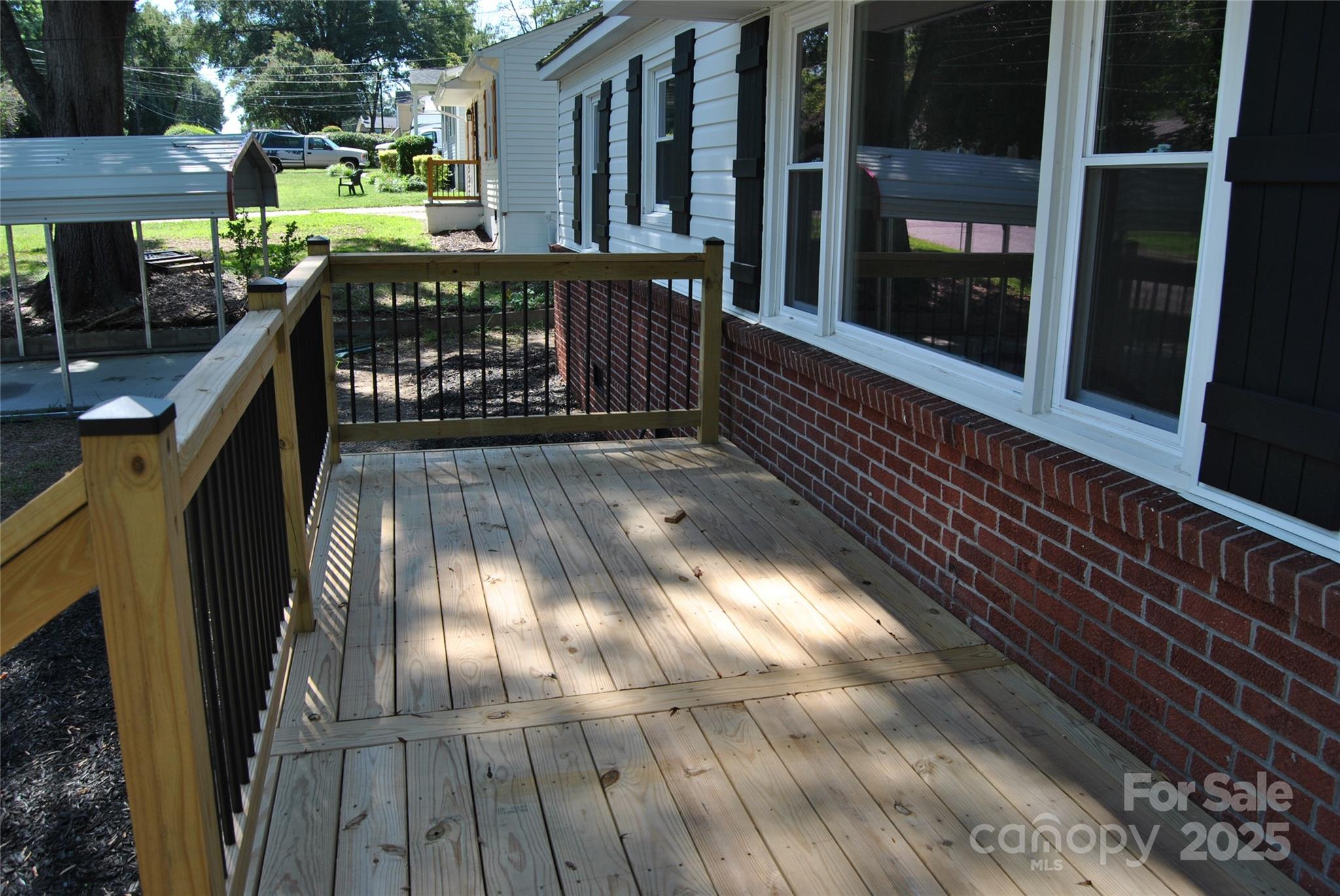 1737 Findlay Street Gastonia, NC 28052 - Photo 4 of 35 a view of balcony with wooden floor