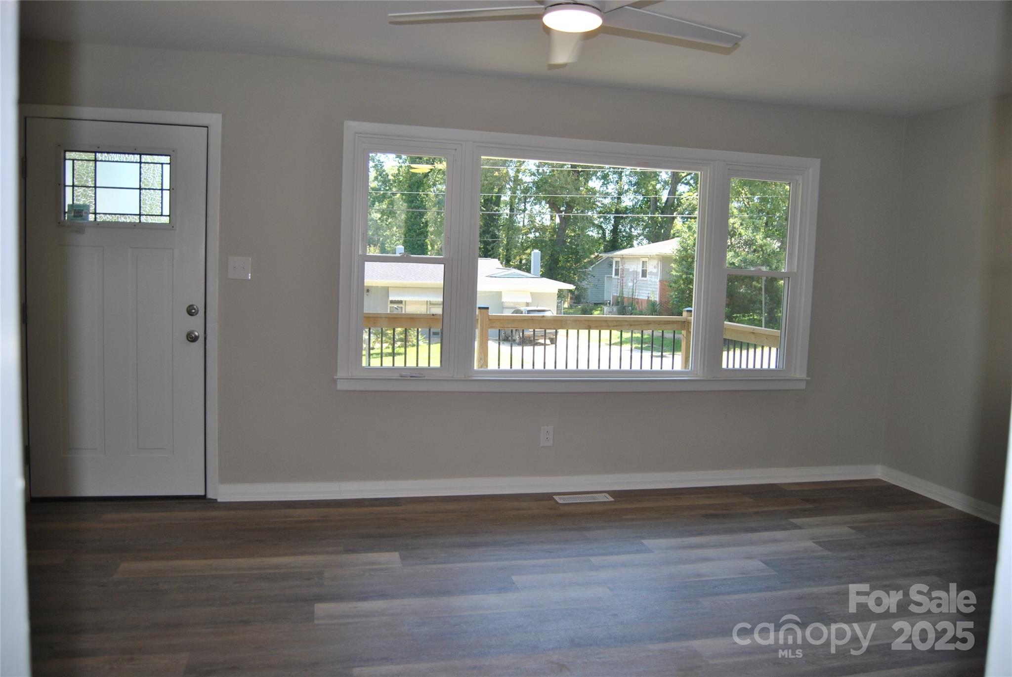 1737 Findlay Street Gastonia, NC 28052 - Photo 7 of 35 a view of empty room with wooden floor and fan