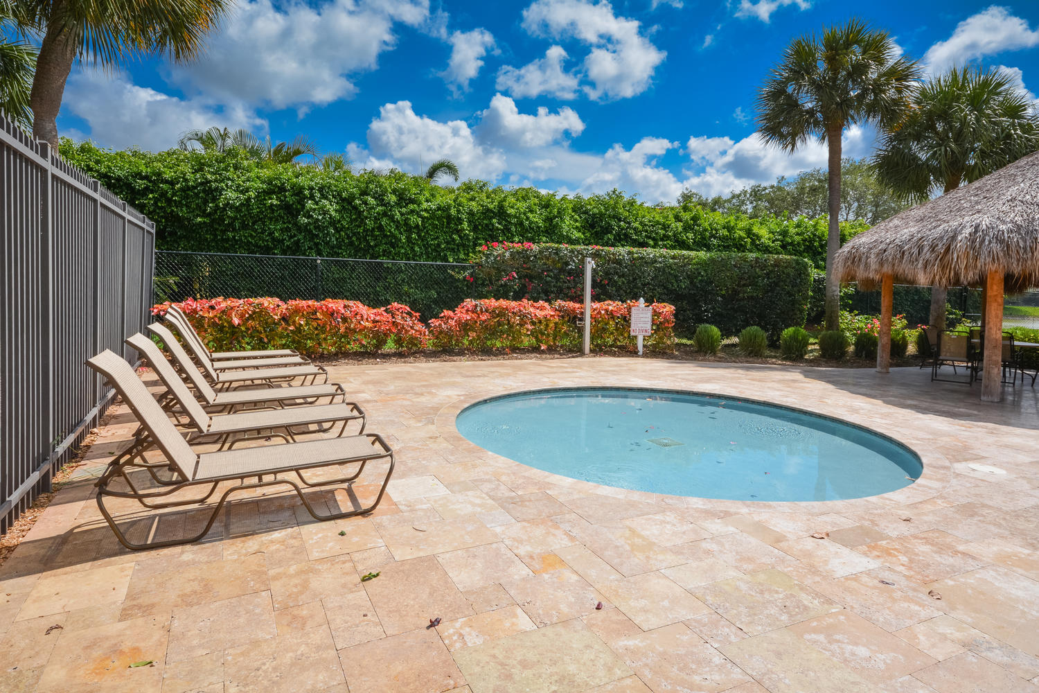 22166 Appleton Drive Boca Raton, FL 33428 - Photo 32 of 47 a view of a swimming pool with a patio