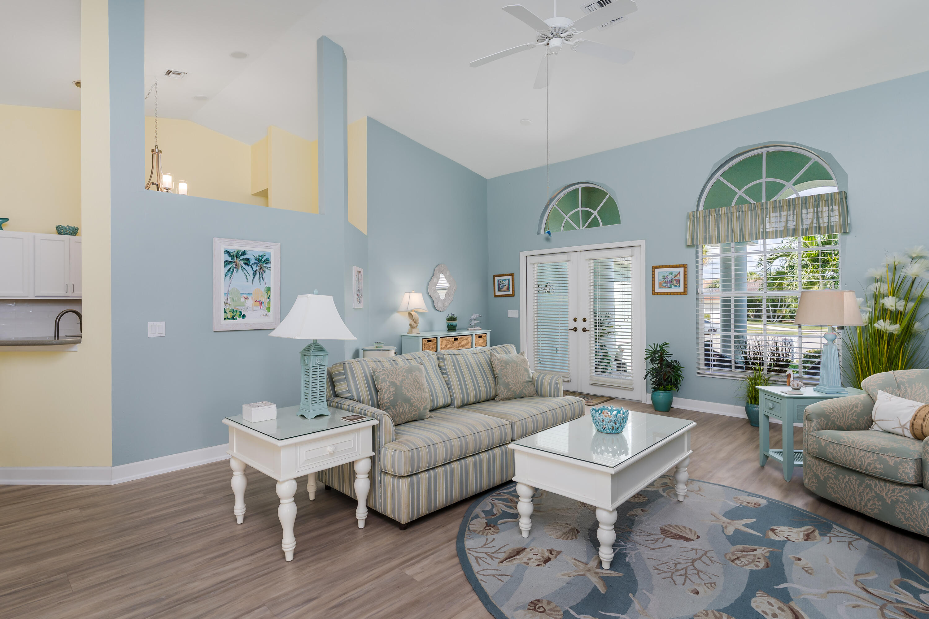 951 Java Court Marco Island, FL 34145 - Photo 14 of 55 a living room with furniture a chandelier and a window