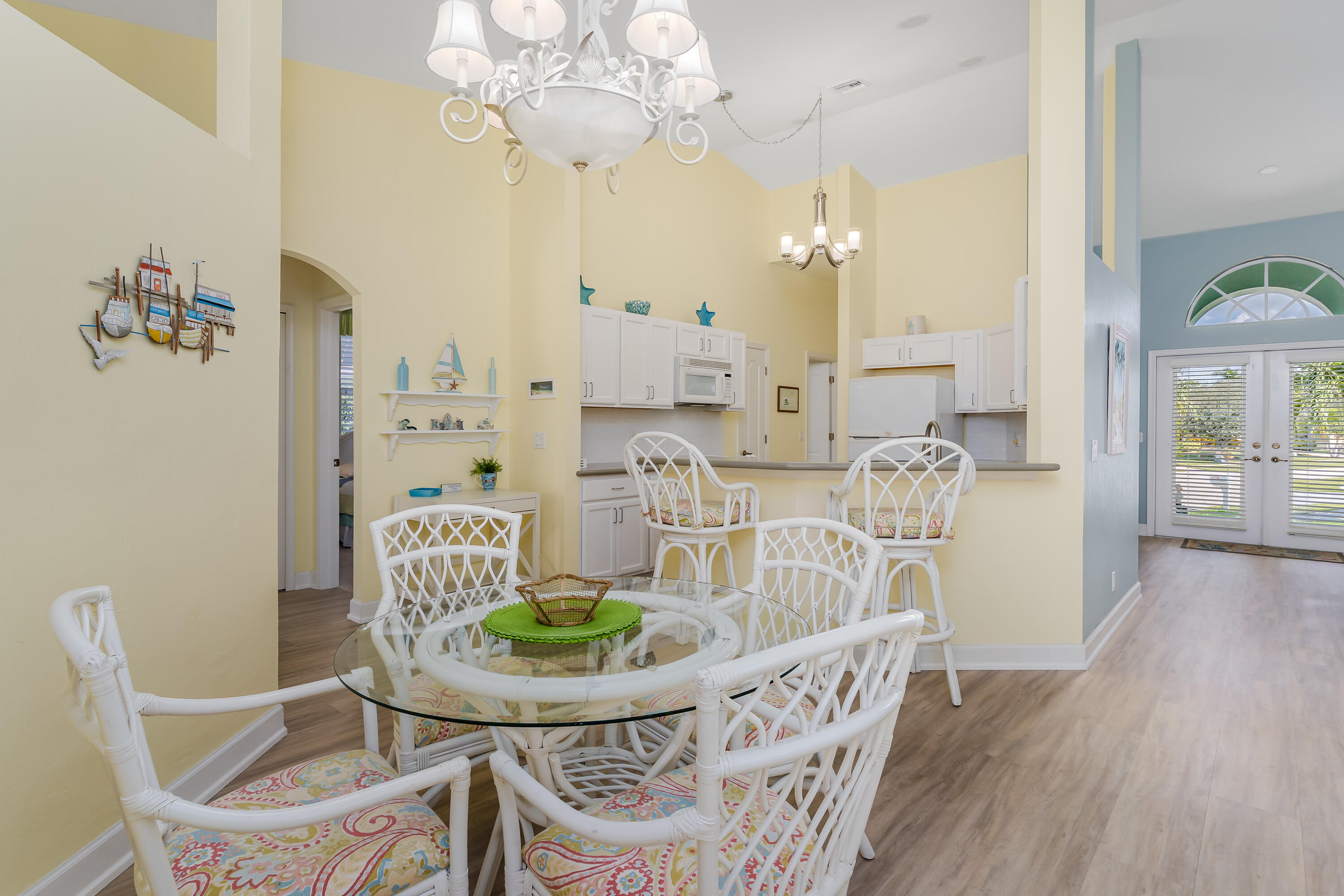 951 Java Court Marco Island, FL 34145 - Photo 17 of 55 a view of a dining room with furniture and wooden floor