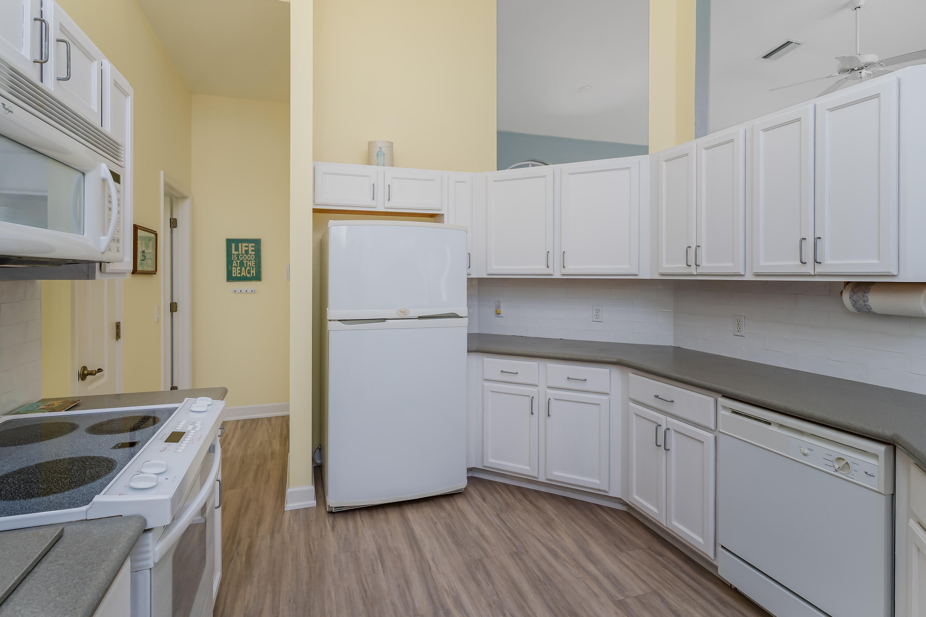 951 Java Court Marco Island, FL 34145 - Photo 21 of 55 a kitchen with cabinets appliances and a counter space