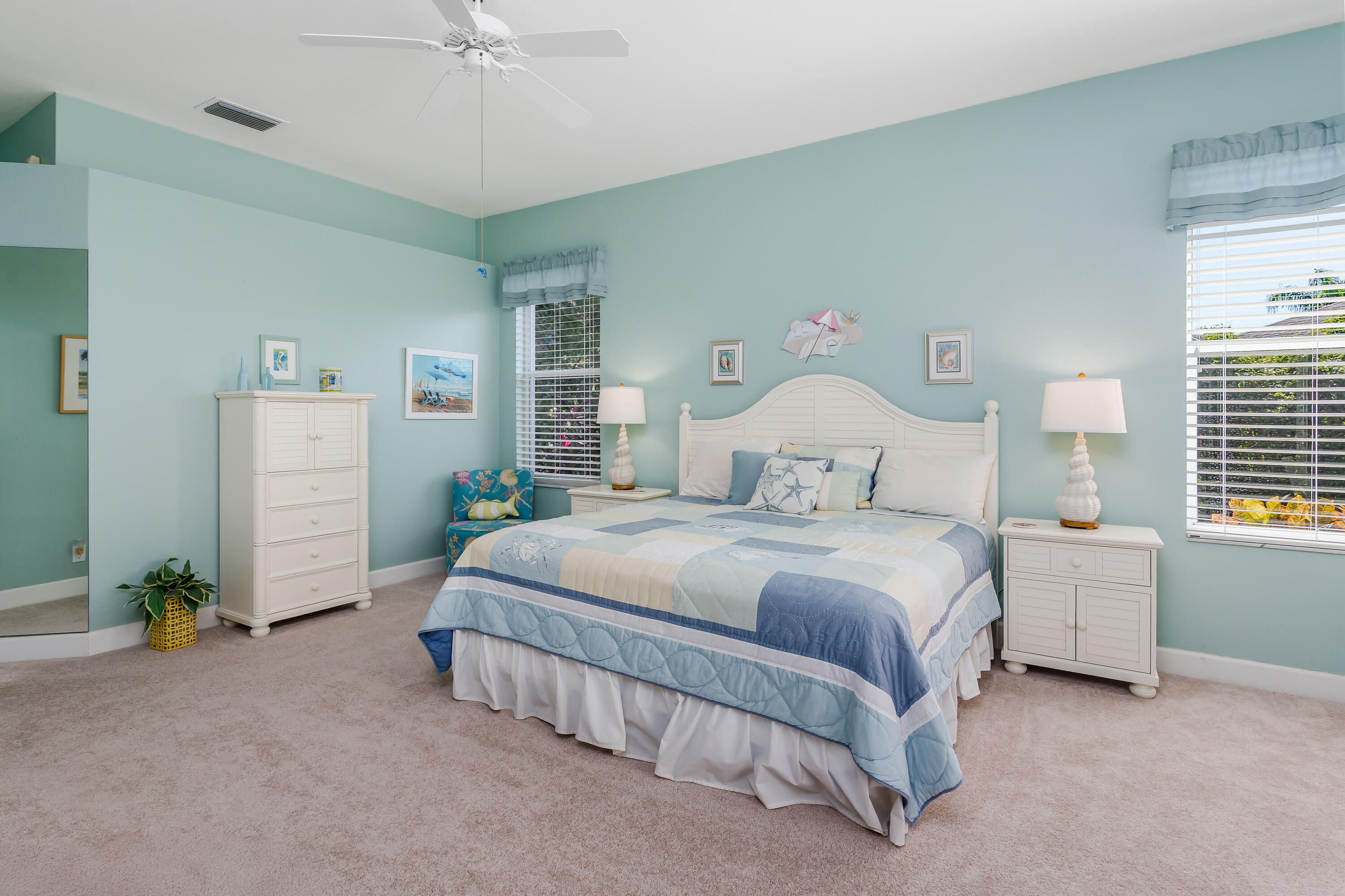 951 Java Court Marco Island, FL 34145 - Photo 24 of 55 a bedroom with bed and a chandelier