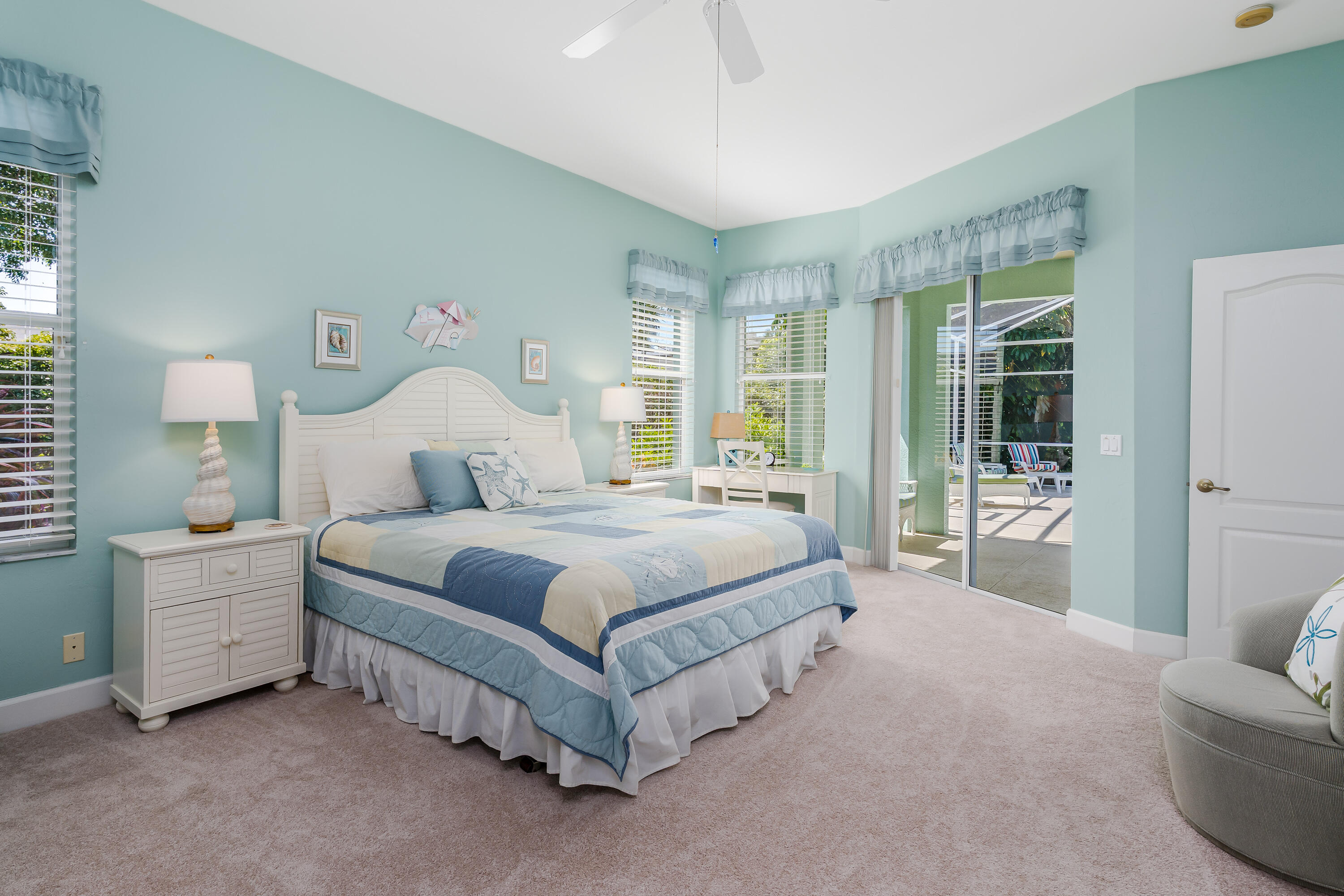 951 Java Court Marco Island, FL 34145 - Photo 26 of 55 a bedroom with a bed and a couch