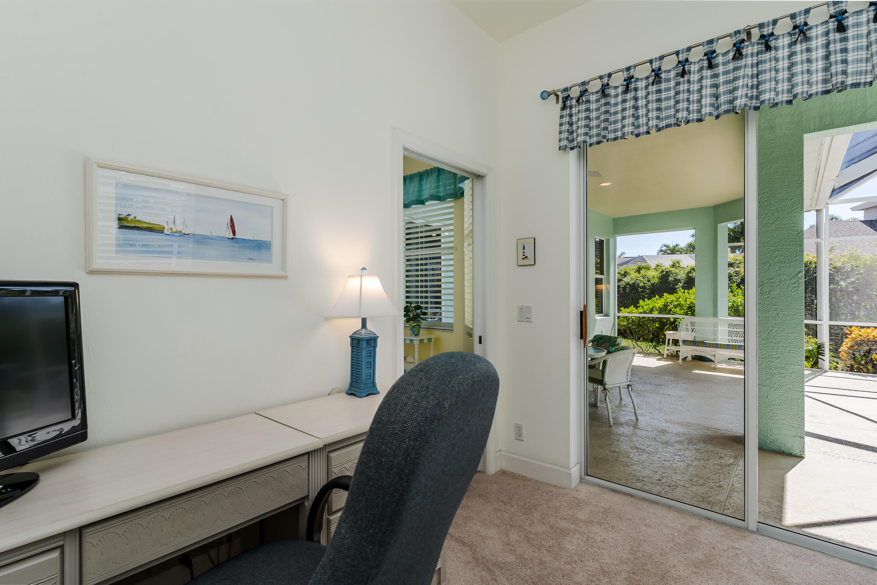 951 Java Court Marco Island, FL 34145 - Photo 33 of 55 a workspace with furniture and a potted plant