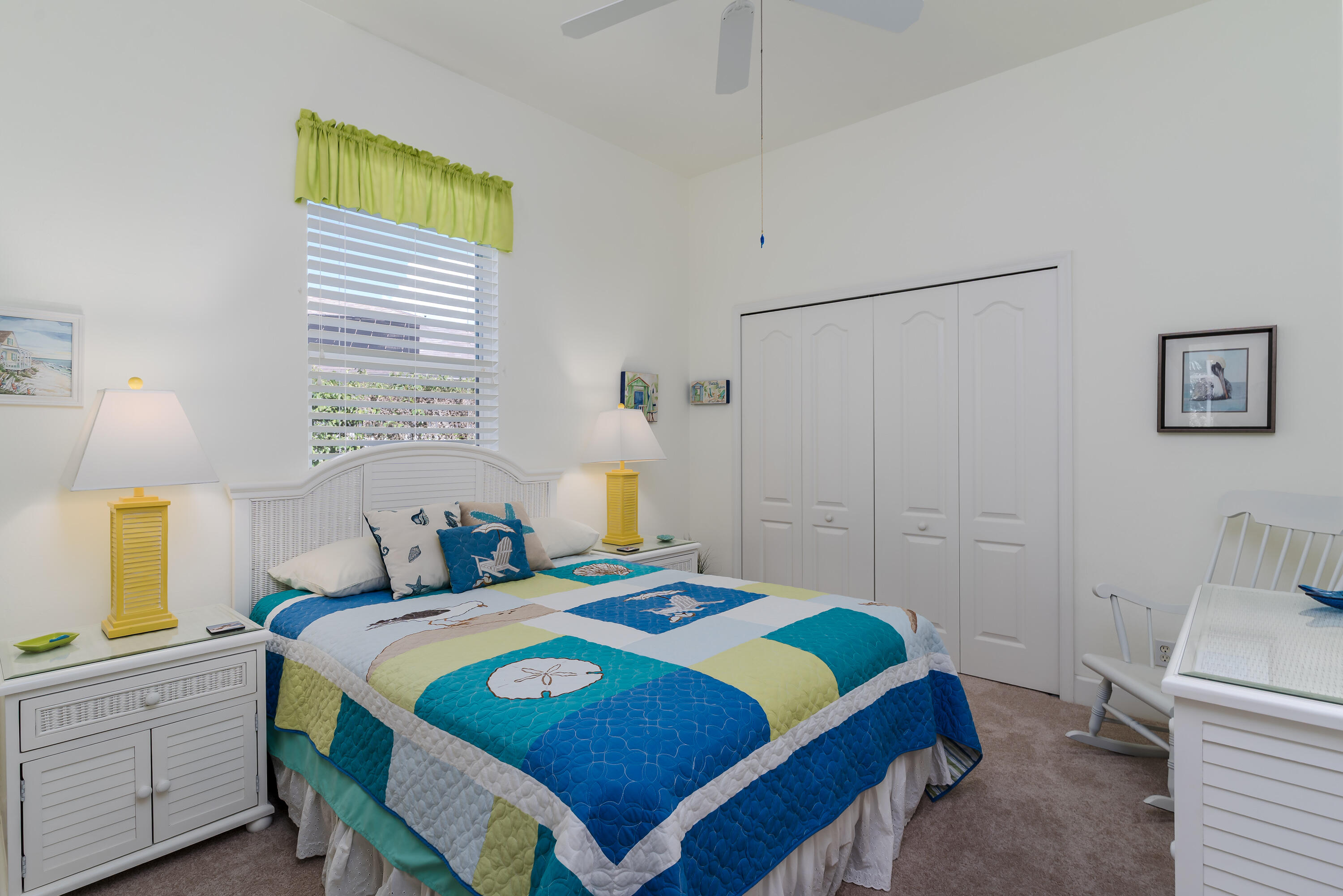 951 Java Court Marco Island, FL 34145 - Photo 34 of 55 a bedroom that has a bed and a table in it