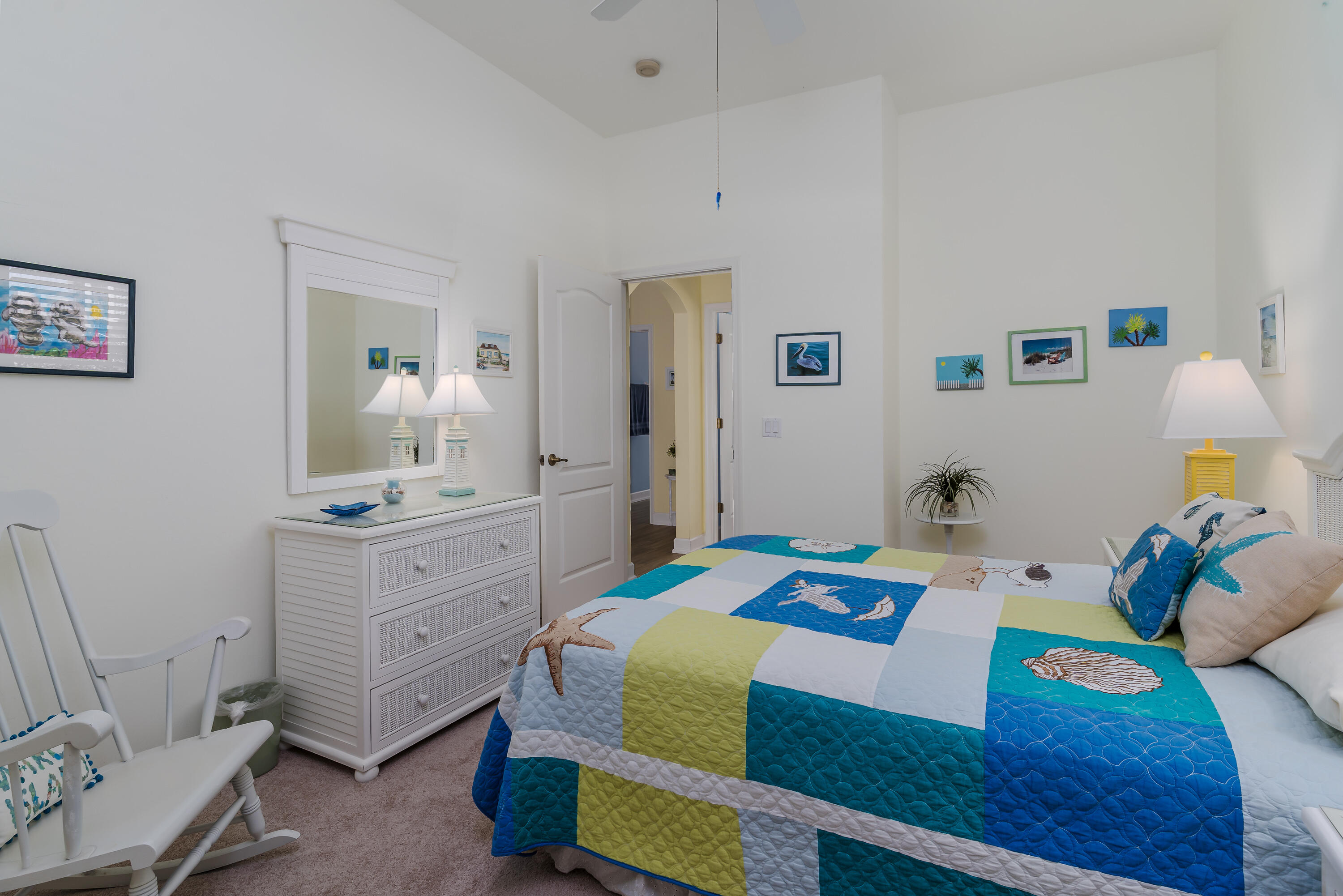 951 Java Court Marco Island, FL 34145 - Photo 35 of 55 a bedroom that has a bed and a table in it