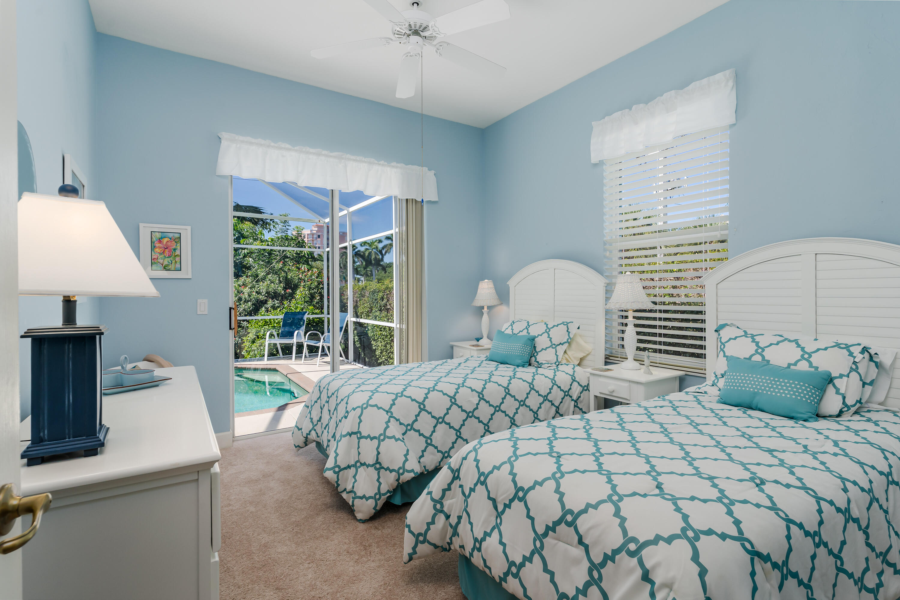 951 Java Court Marco Island, FL 34145 - Photo 36 of 55 a bedroom with a bed and a window