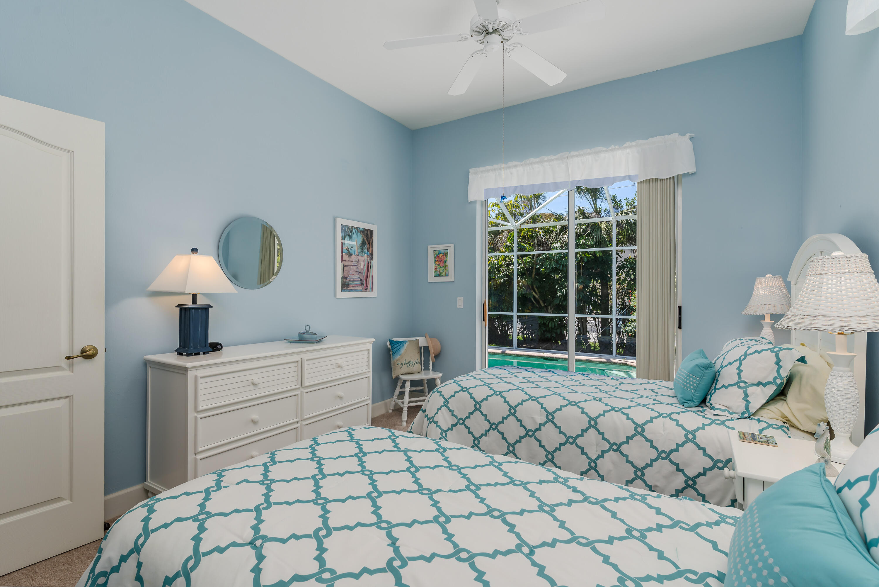 951 Java Court Marco Island, FL 34145 - Photo 37 of 55 a bed room with a bed and a table