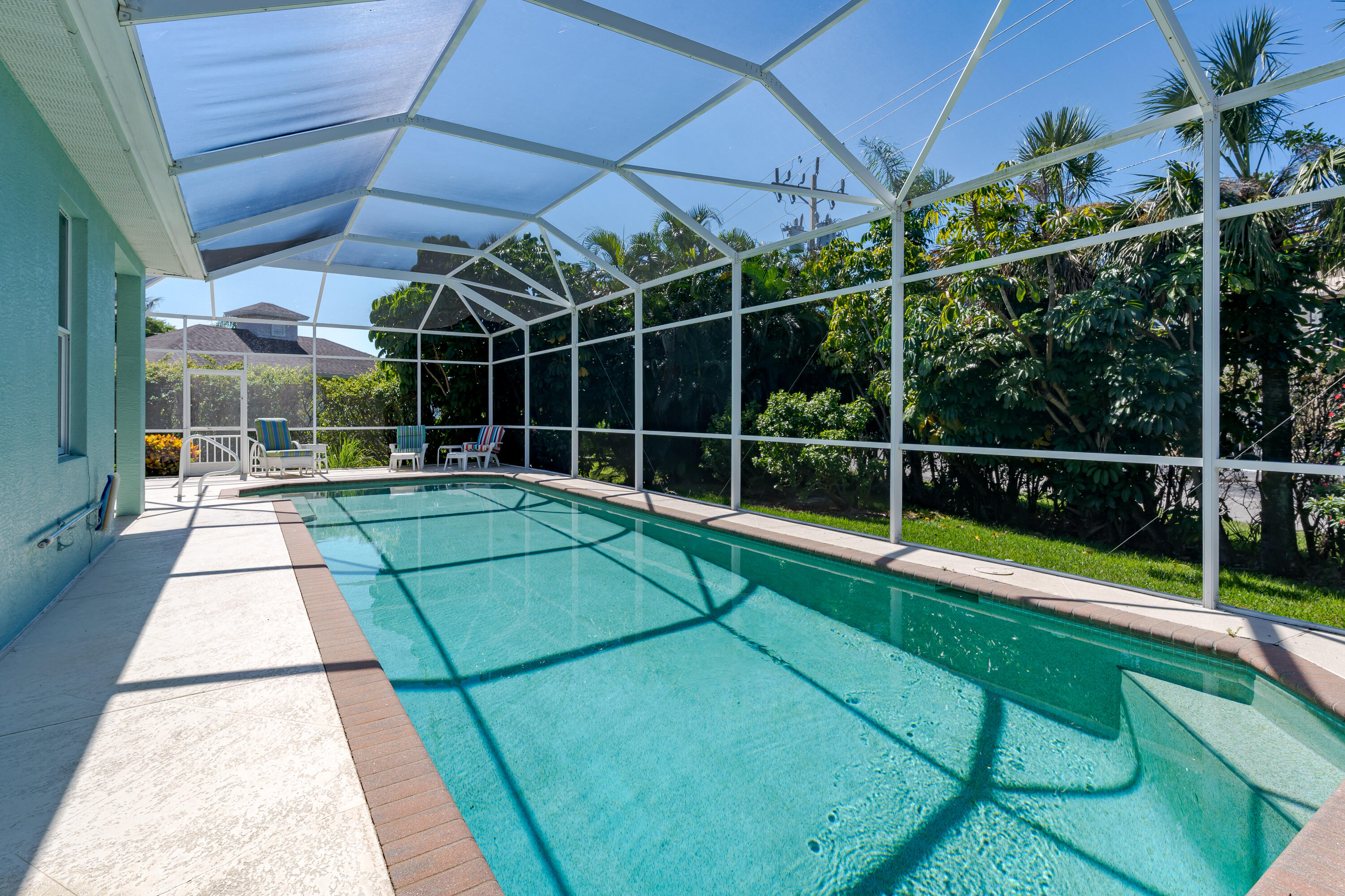 951 Java Court Marco Island, FL 34145 - Photo 8 of 55 a view of a backyard with swimming pool