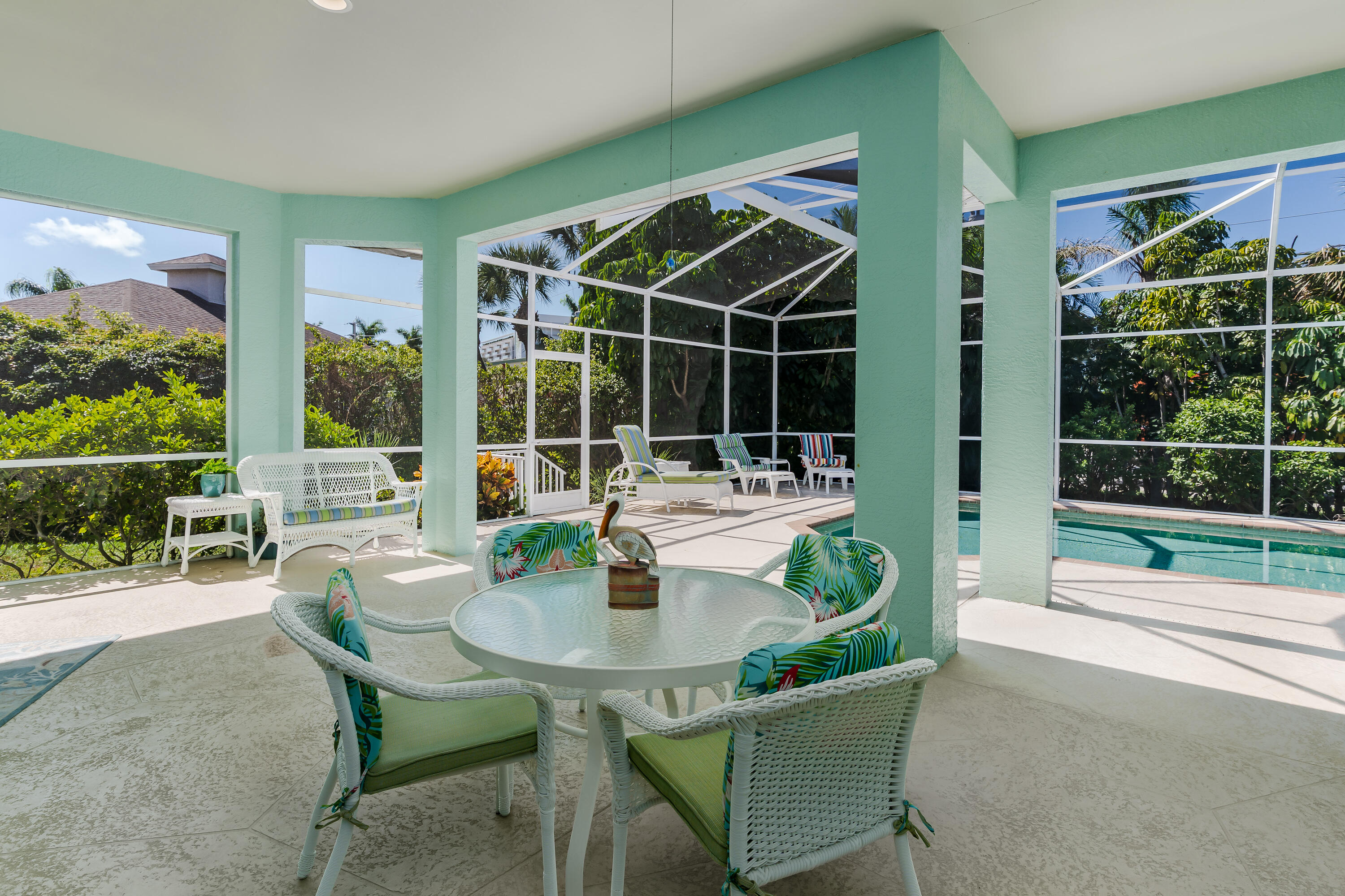 951 Java Court Marco Island, FL 34145 - Photo 10 of 55 a dining room with furniture and window