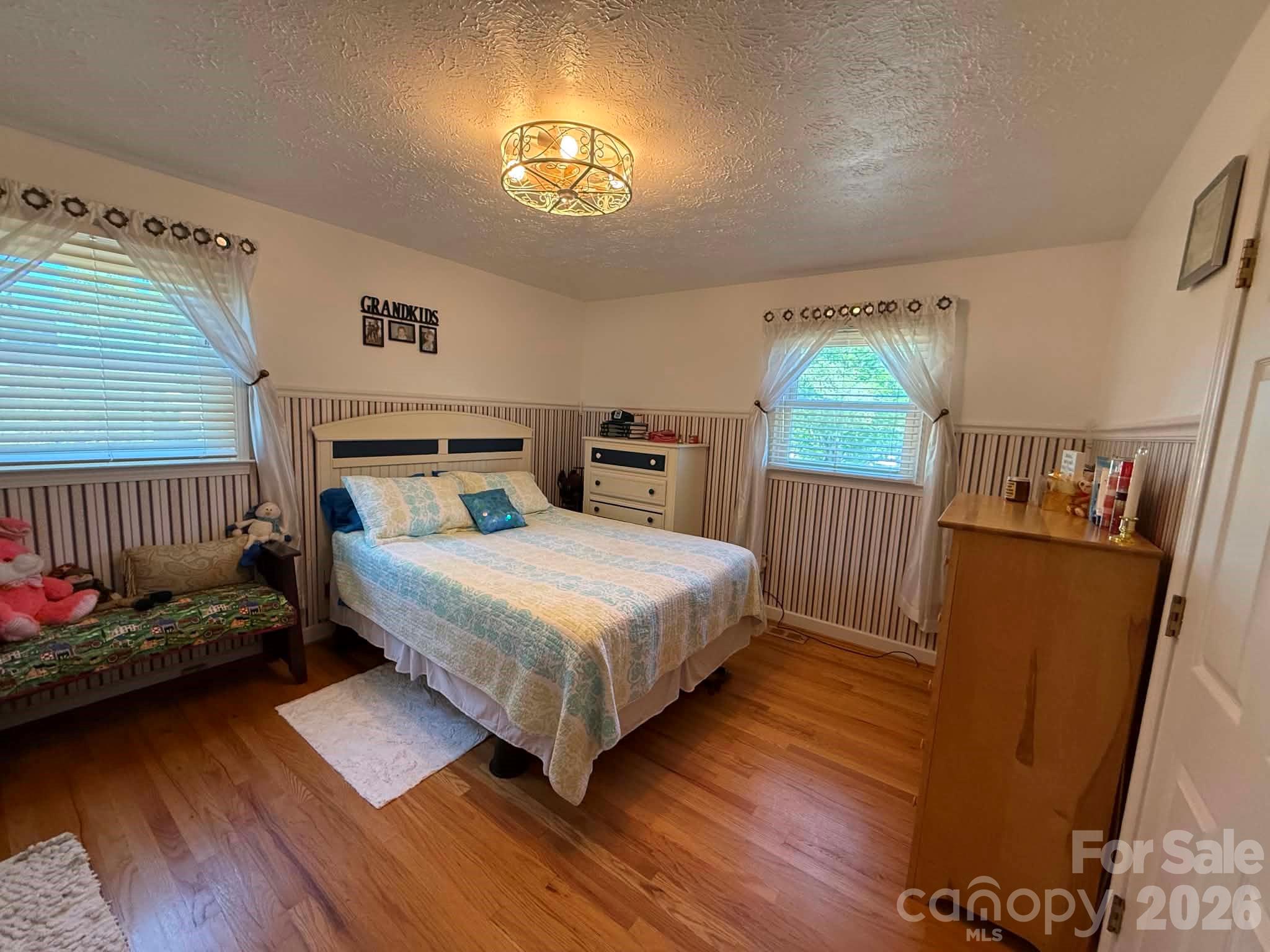 2121 Union Grove Road Lenoir, NC 28645 - Photo 22 of 38 a bedroom with a bed and a view of kitchen