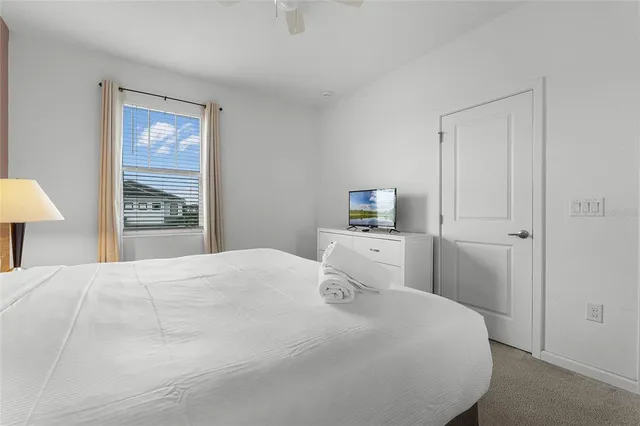 a bathroom with a double vanity sink mirror and