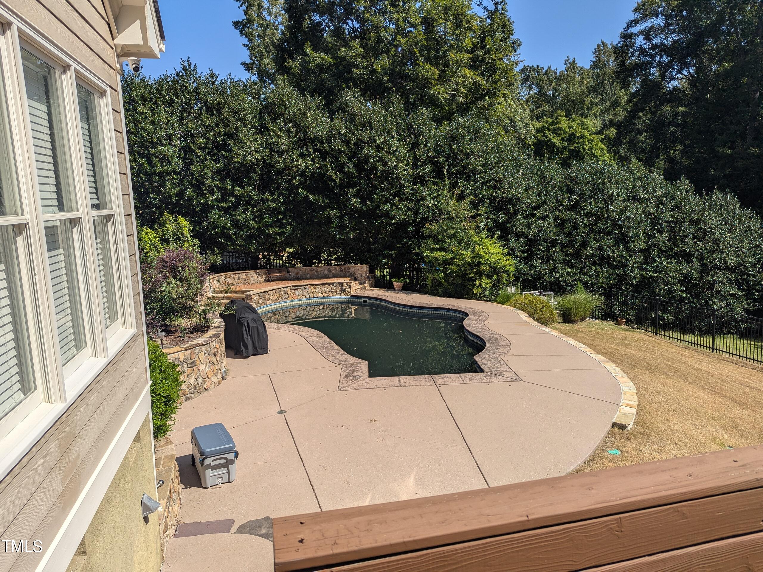 151 Michael Way Clayton, NC 27520 - Photo 13 of 36 a view of a roof deck with couches and wooden floor
