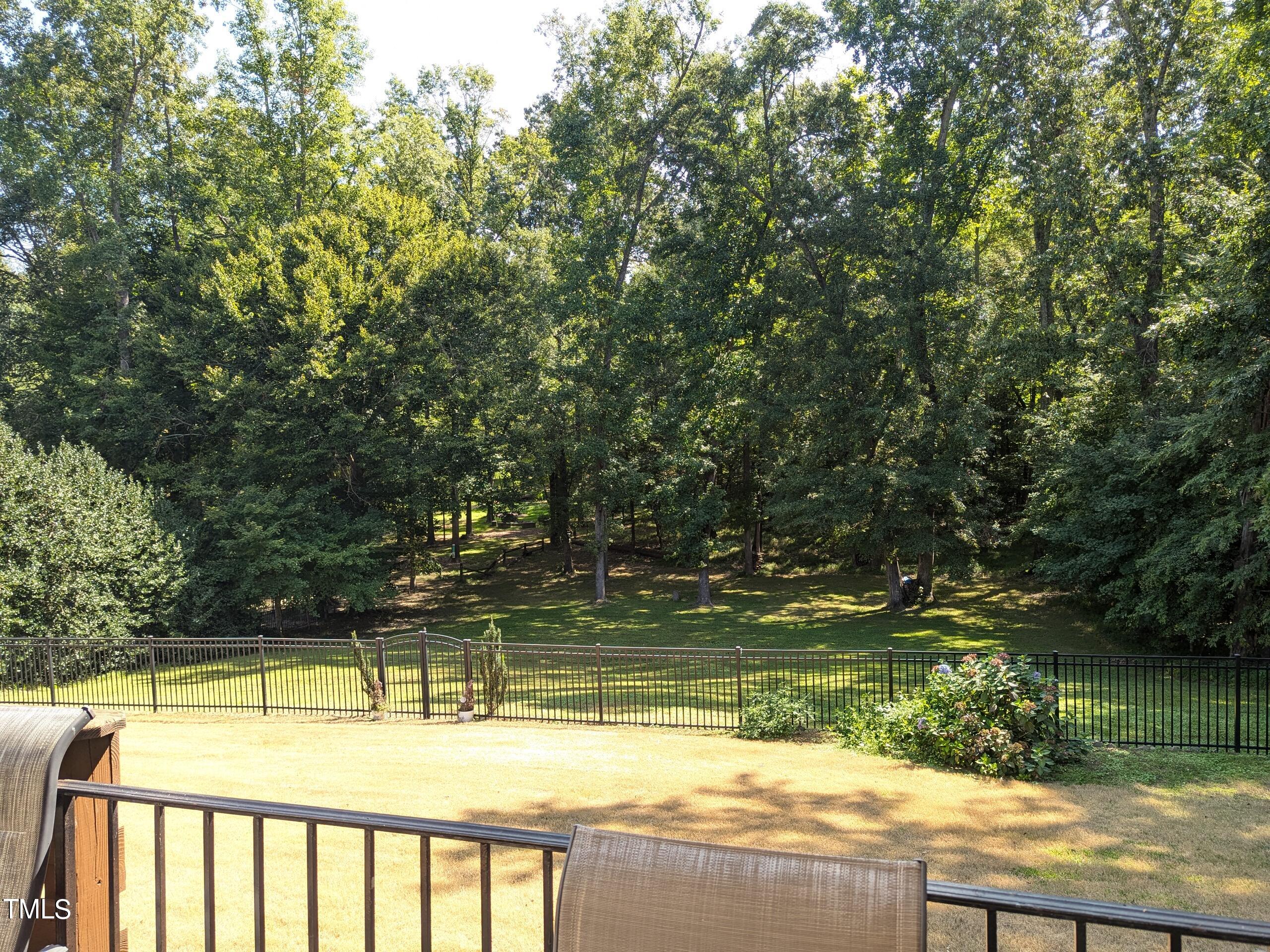 151 Michael Way Clayton, NC 27520 - Photo 14 of 36 a view of swimming pool with a yard