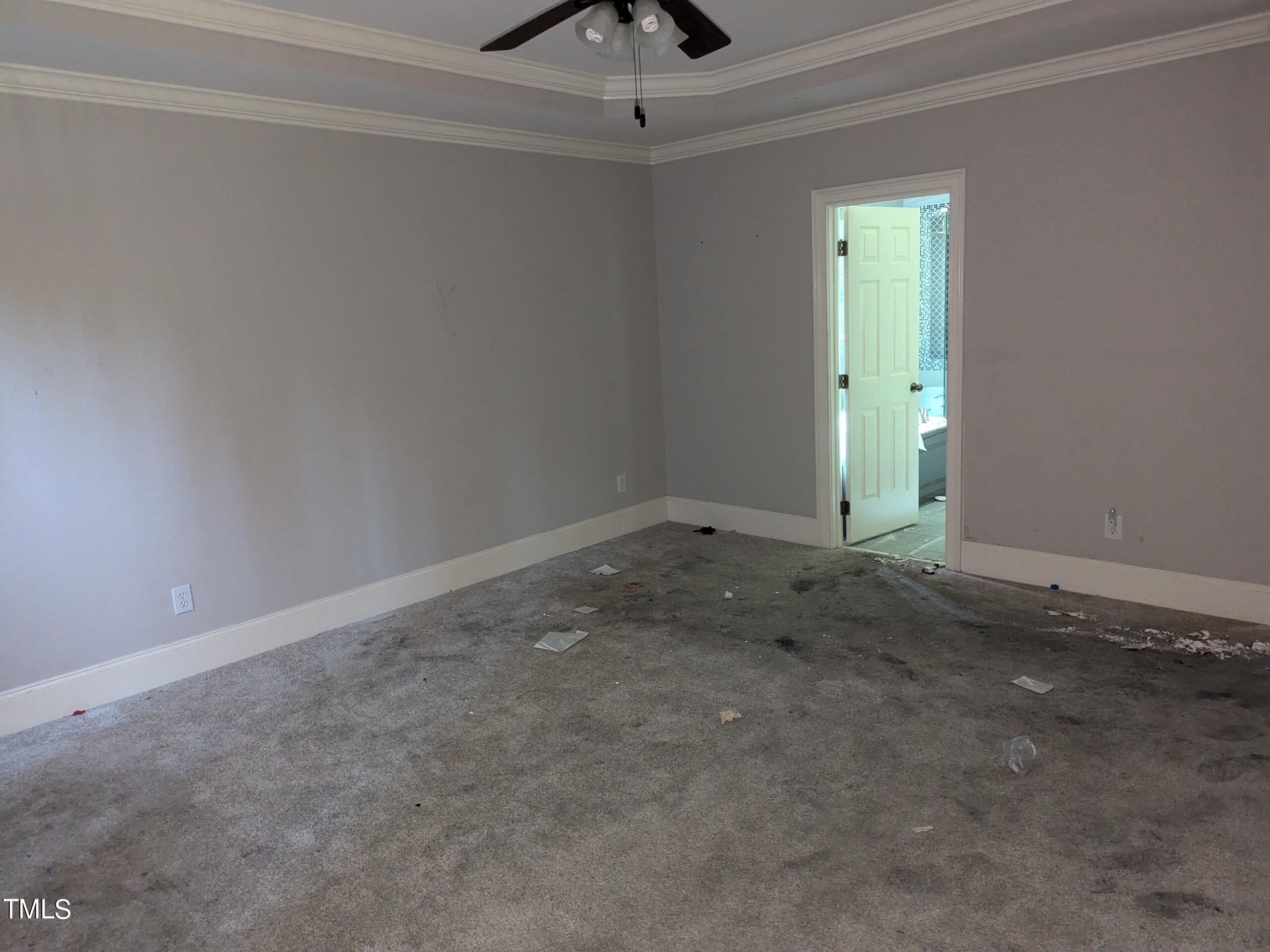 151 Michael Way Clayton, NC 27520 - Photo 22 of 36 a view of an empty room with a window