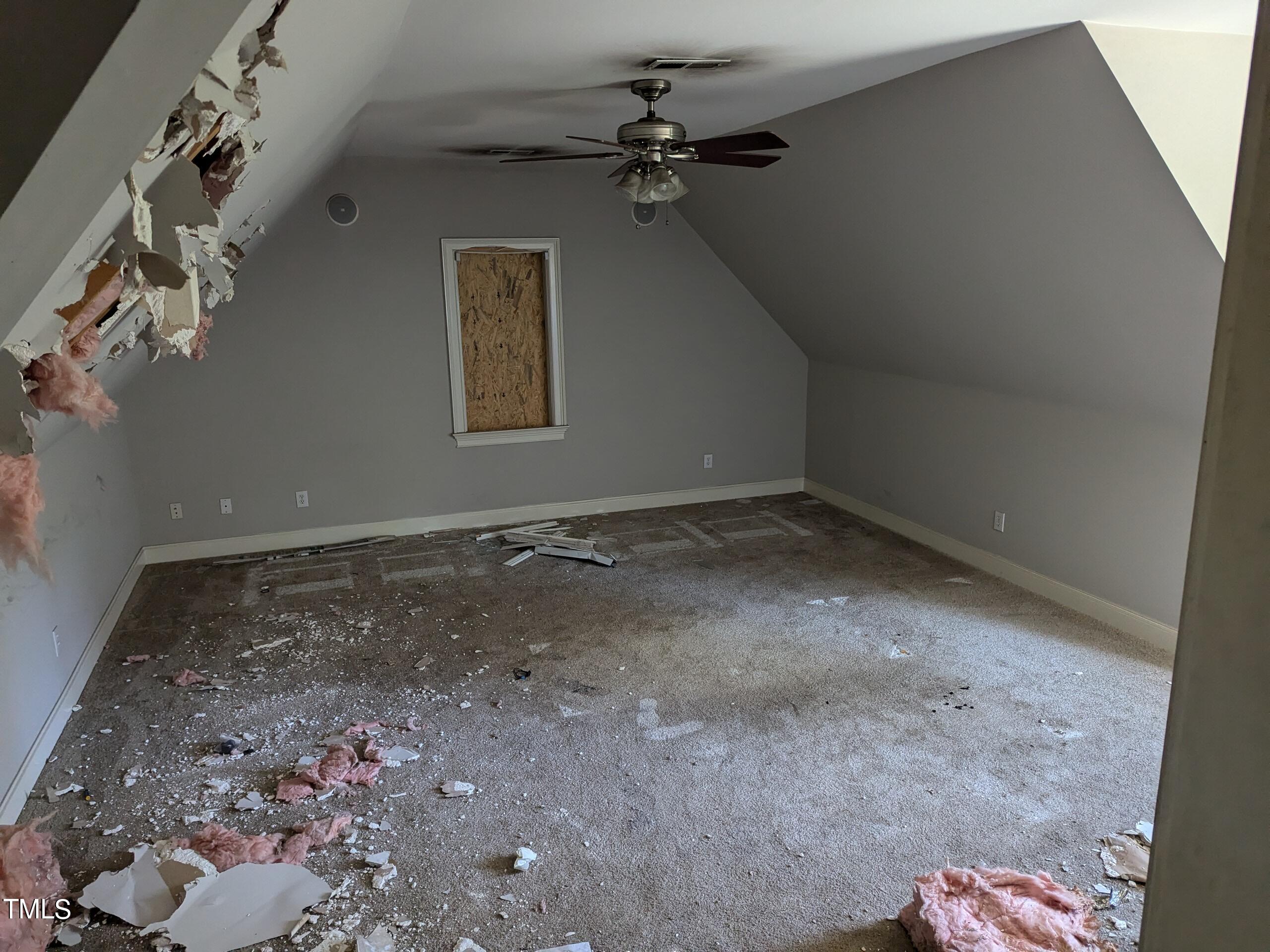 151 Michael Way Clayton, NC 27520 - Photo 27 of 36 a view of a room with a chandelier