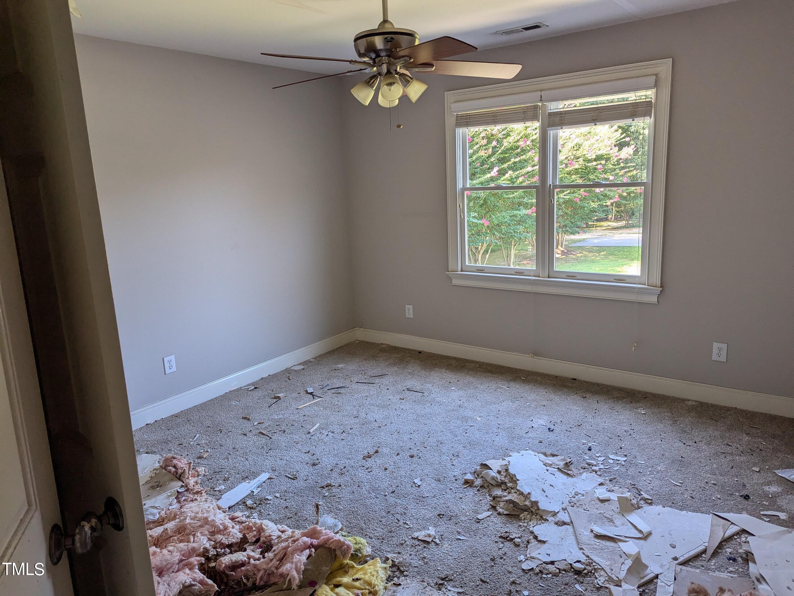 151 Michael Way Clayton, NC 27520 - Photo 30 of 36 an empty room with windows