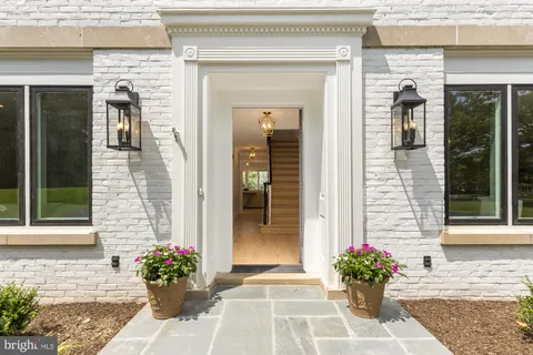 a front view of a house with a porch