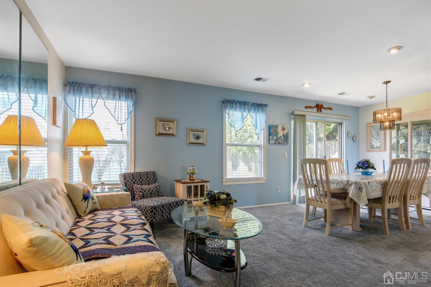 149 Woodbury Road Edison, NJ 08820 - Photo 4 of 19 a living room with furniture and a window