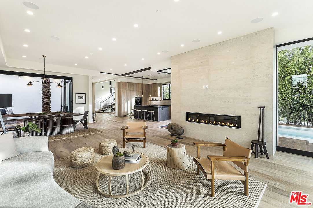 8566 Colgate Avenue Los Angeles, CA 90048 - Photo 1 of 22 a living room with furniture and a wooden floor