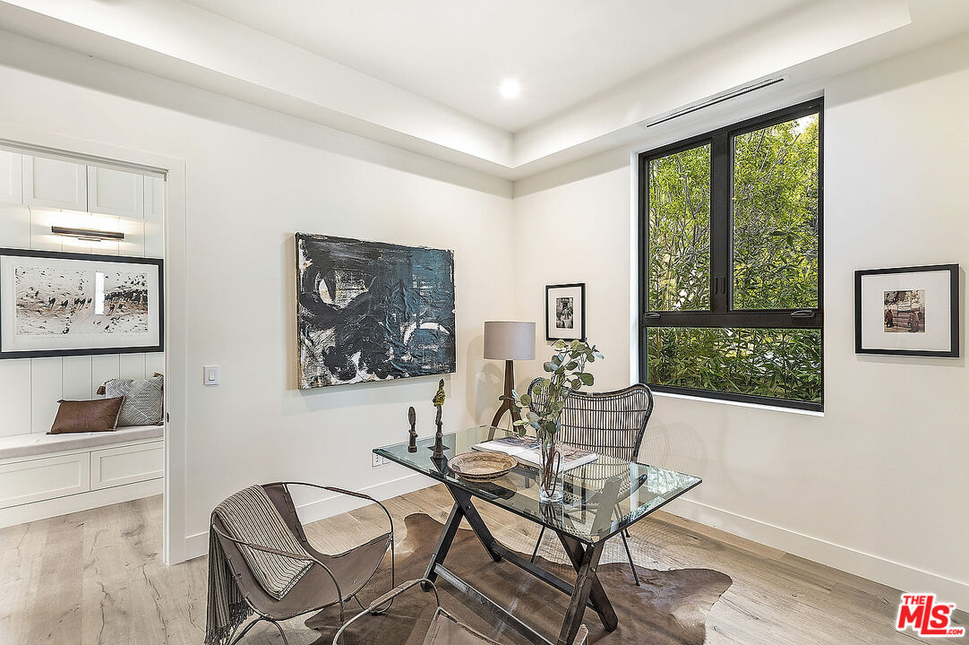 8566 Colgate Avenue Los Angeles, CA 90048 - Photo 11 of 22 a view of a livingroom with furniture and a window