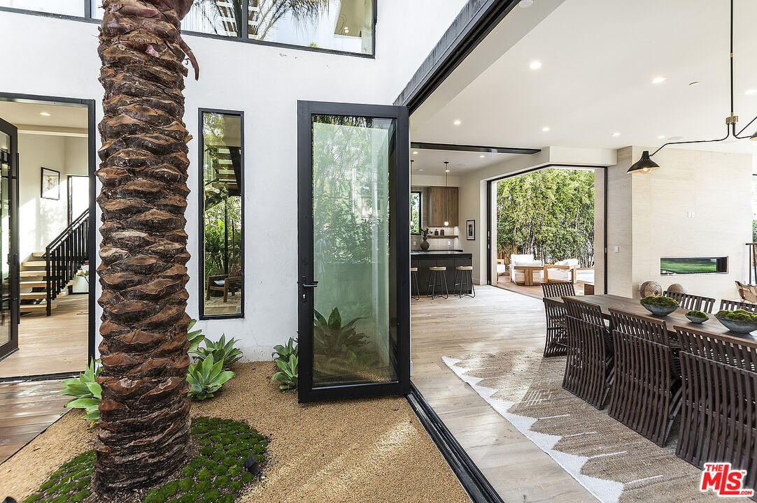 8566 Colgate Avenue Los Angeles, CA 90048 - Photo 3 of 22 a lobby with furniture and floor to ceiling window