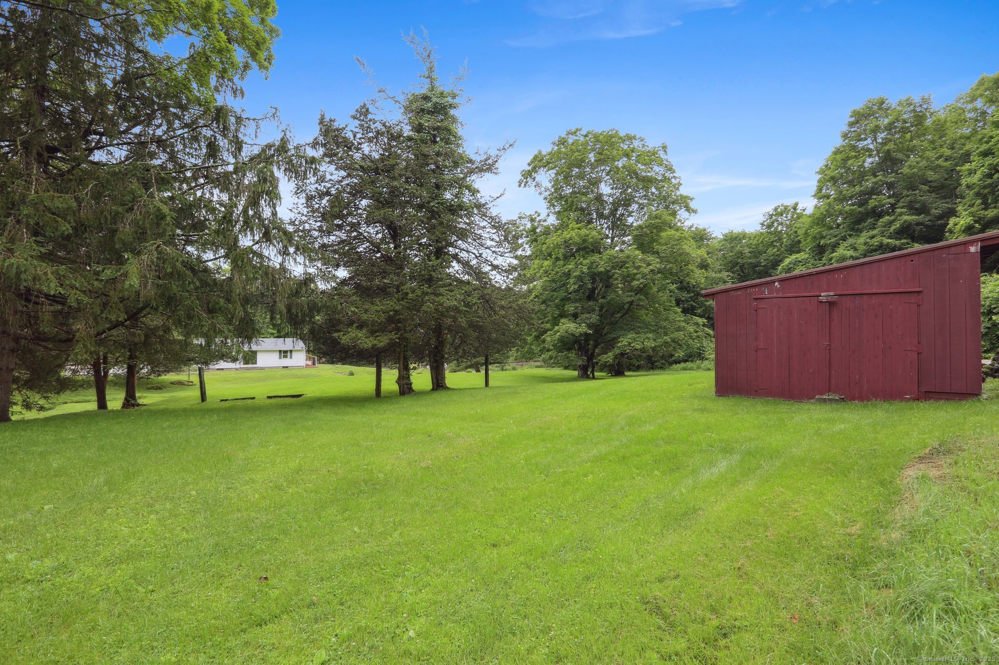 77 Old Middle Road Brookfield, CT 06804 - Photo 23 of 31 a view of a field of grass and trees