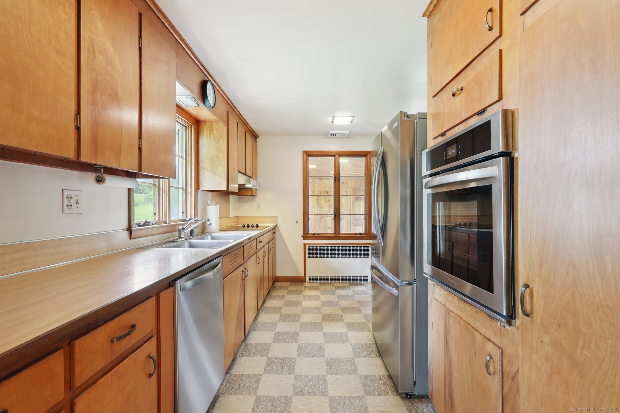 77 Old Middle Road Brookfield, CT 06804 - Photo 4 of 31 a kitchen with stainless steel appliances a sink stove and cabinets