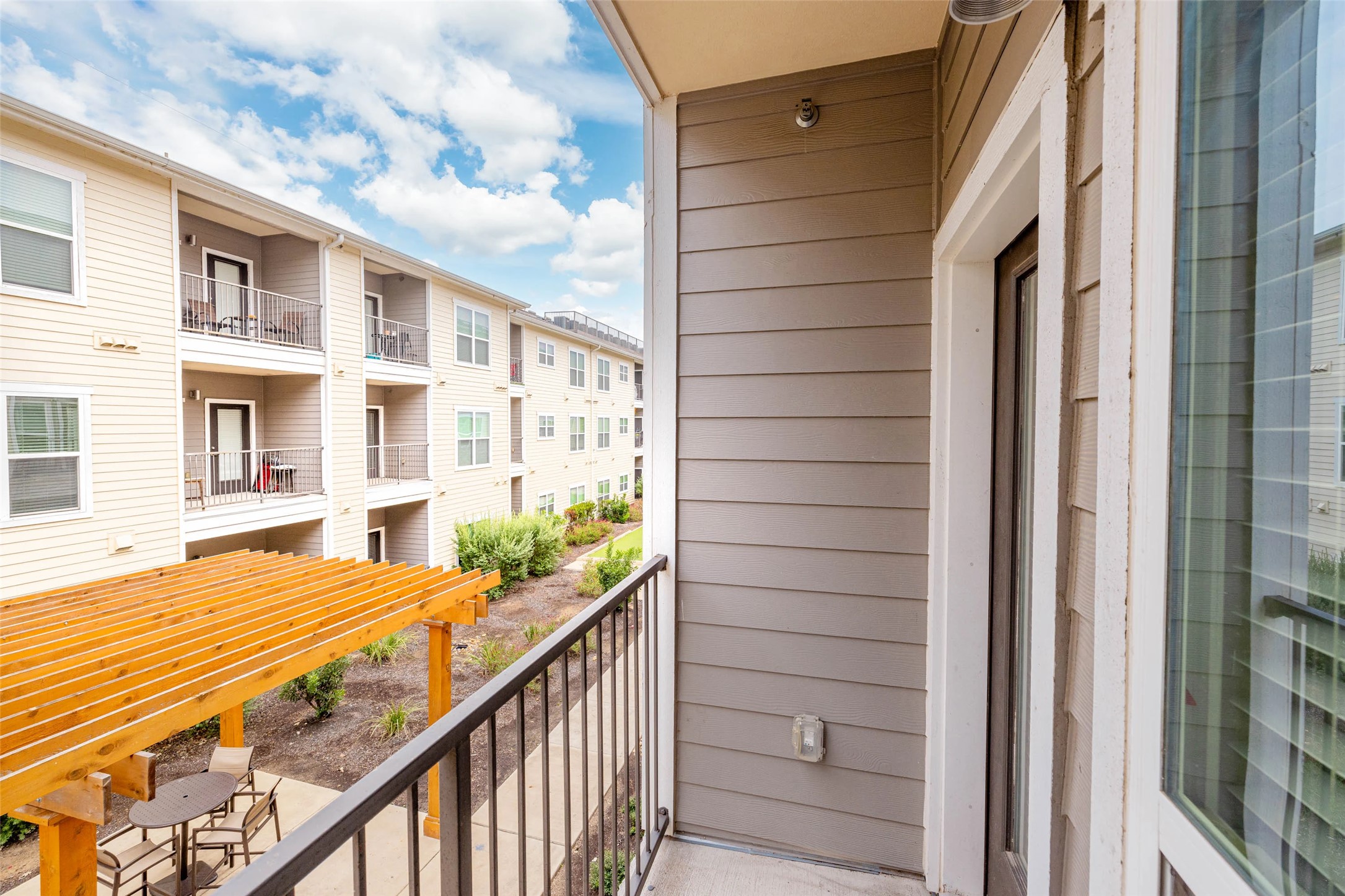 6725 Circle S Road, Unit C1125 Austin, TX 78745 - Photo 13 of 13 a view of balcony with furniture