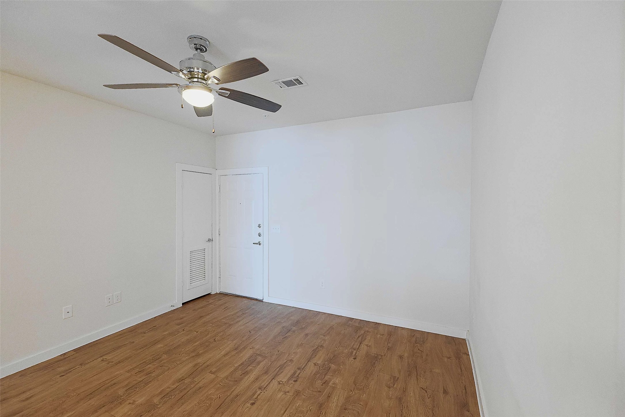 6725 Circle S Road, Unit C1125 Austin, TX 78745 - Photo 3 of 13 wooden floor in an empty room