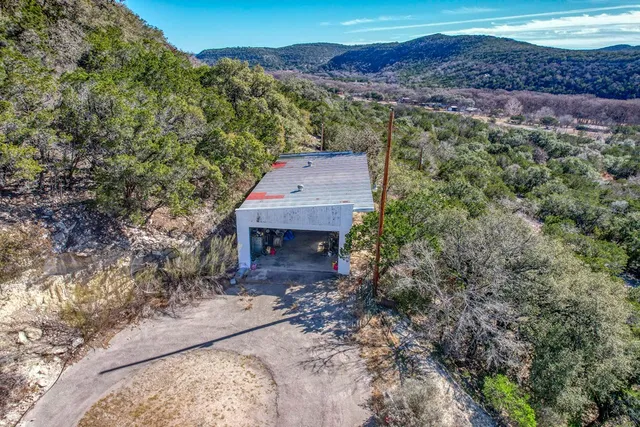 a view of a yard with a tree