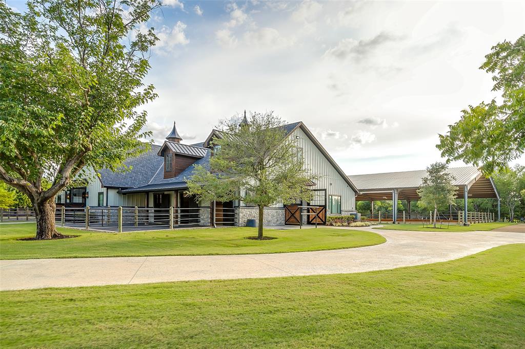 5000 T W King Road Southlake, TX 76092 - Photo 20 of 40 a view of building with trees in the background