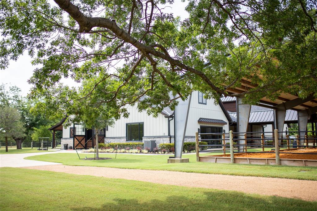 5000 T W King Road Southlake, TX 76092 - Photo 30 of 40 a view of big yard with plants and large trees