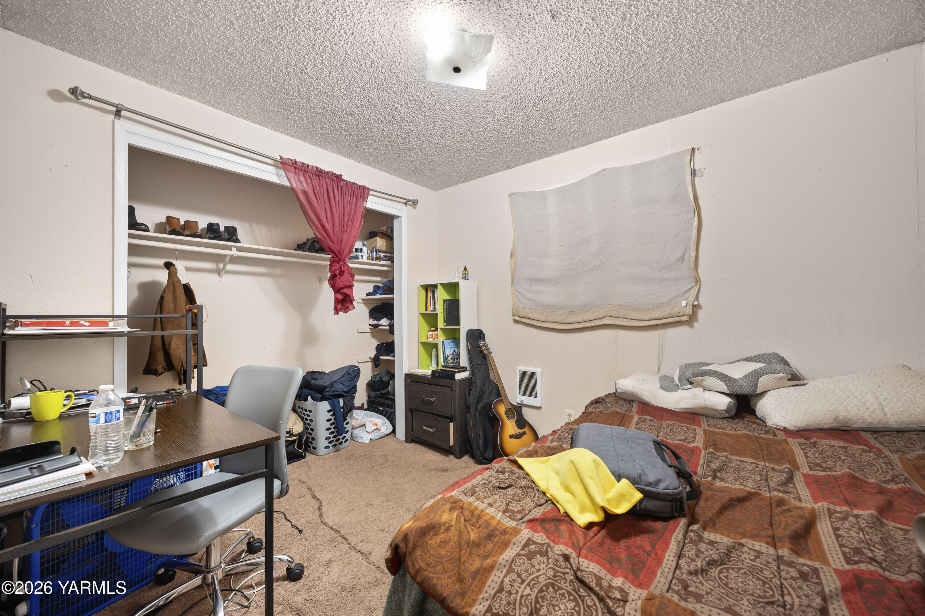 115 East D Street Wapato, WA 98951 - Photo 10 of 28 a bedroom with a bed and a desk